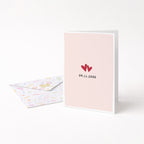 Anniversary love date greeting card standing upright with pastel envelope included